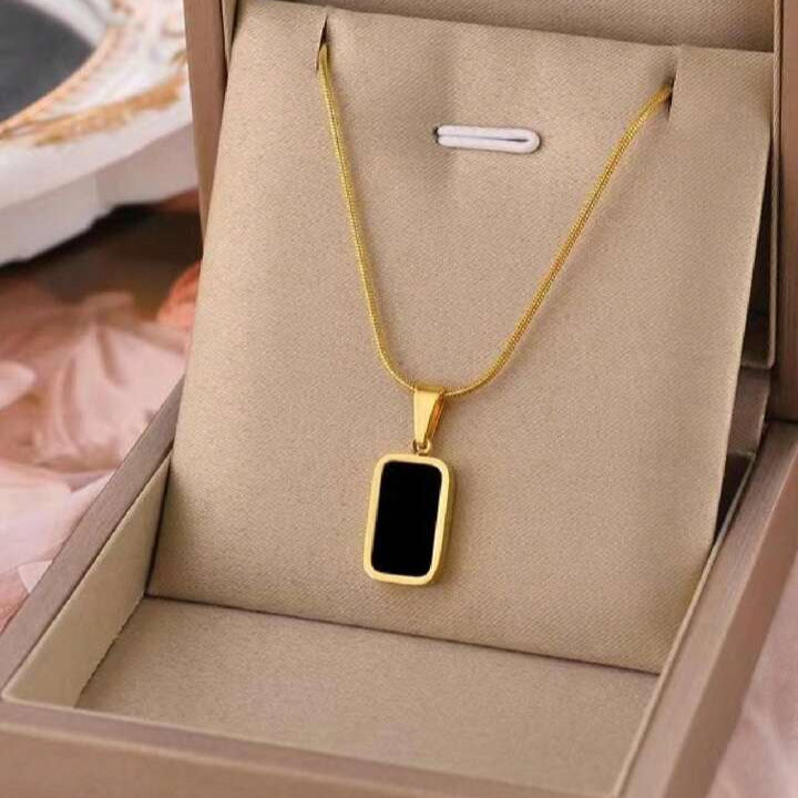 Black Chip Necklace – Bold, Minimal, and Effortlessly Cool Zevare.pk- Black Chip Necklace- Zevare.pk
