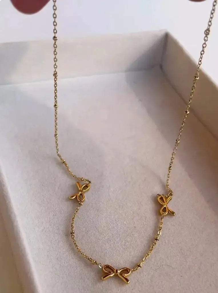 3 Bow Necklace – Sweet, Stylish & So You! 🎀✨ Zevare.pk- 3 Bow style -  artificial nacklace- Zevare.pk- 3 Bow style -  artificial nacklace- Zevare.pk