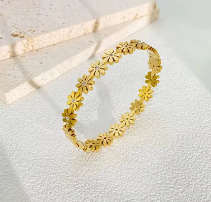 Flower Bangle – Bloom with Every Move Zevare.pk- Flower Bangle- Zevare.pk