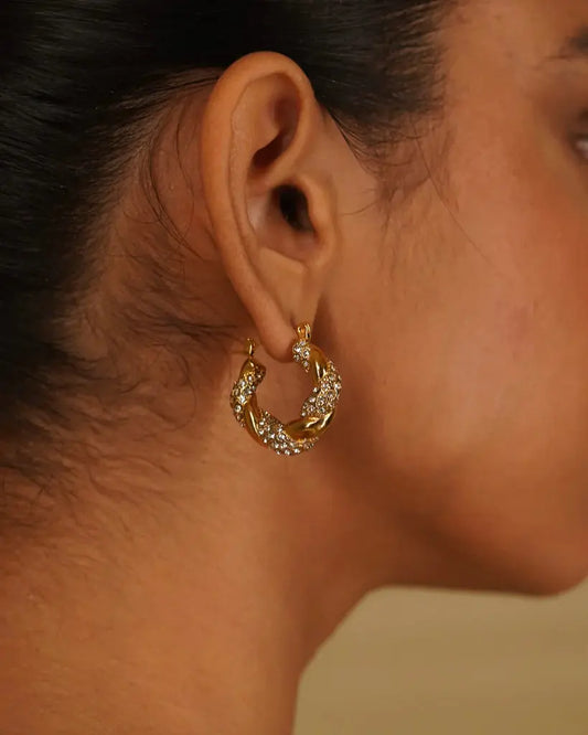 Donna Crystal Twisted Earring – Shine with a Twist Zevare.pk