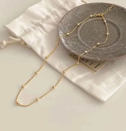 Balls Choker Necklace – Minimal Style, Maximum Impact Zevare.pk