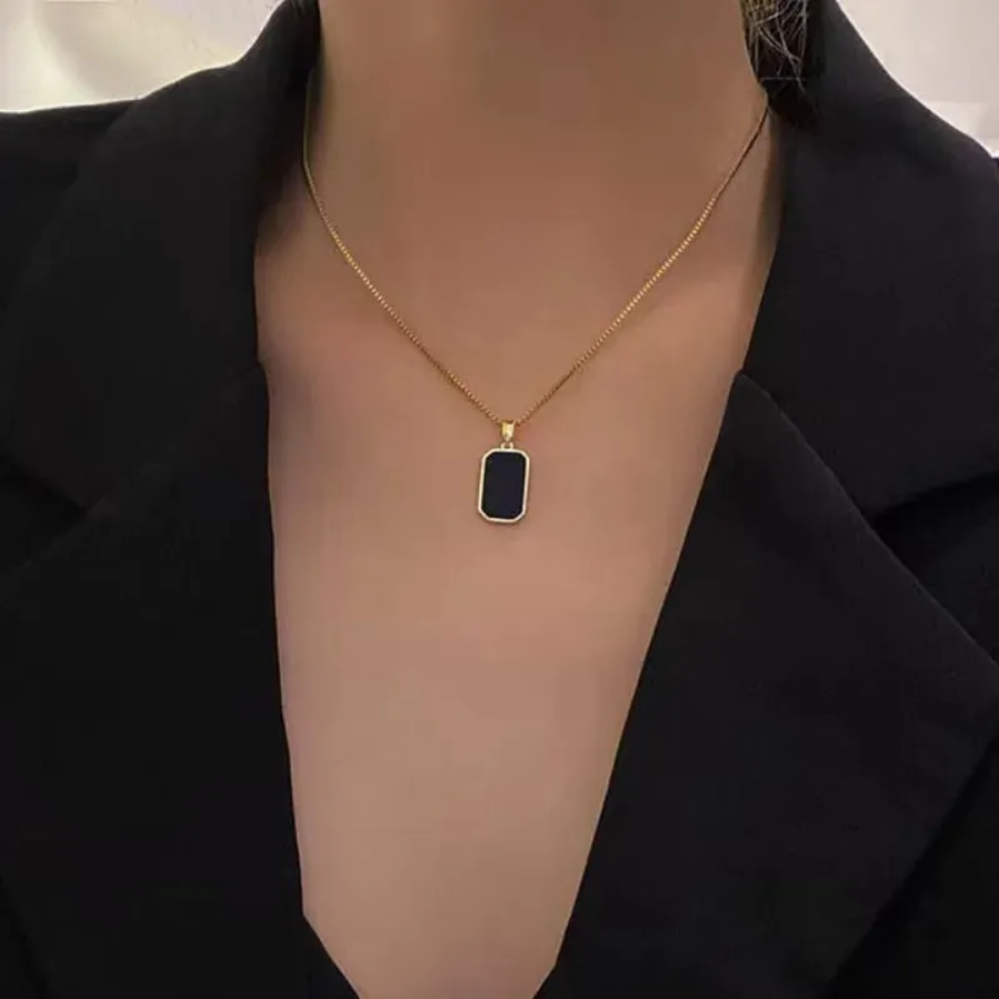 Black Chip Necklace – Bold, Minimal, and Effortlessly Cool Zevare.pk- Black Chip Necklace- Zevare.pk
