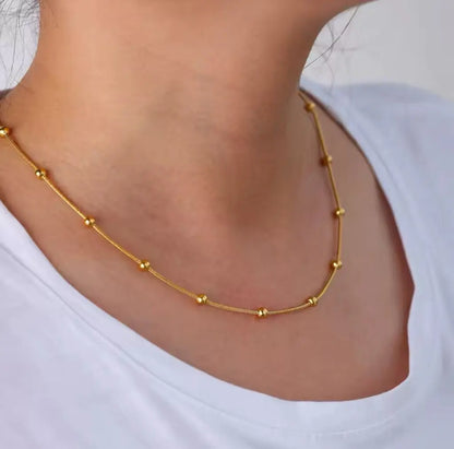 Balls Choker Necklace – Minimal Style, Maximum Impact Zevare.pk