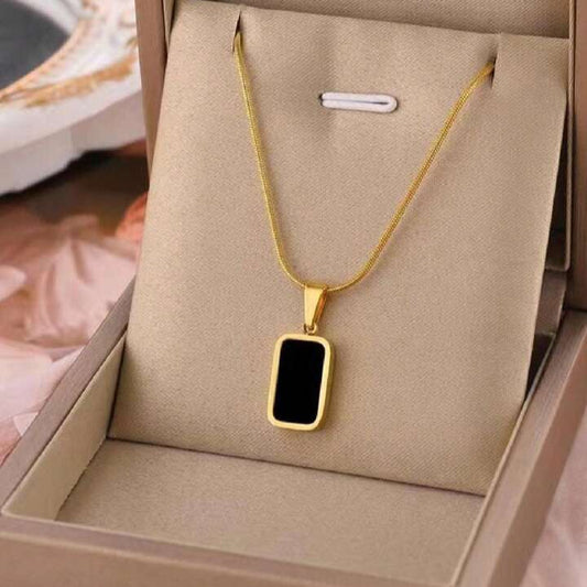 Black Chip Necklace – Bold, Minimal, and Effortlessly Cool Zevare.pk- Black Chip Necklace- Zevare.pk