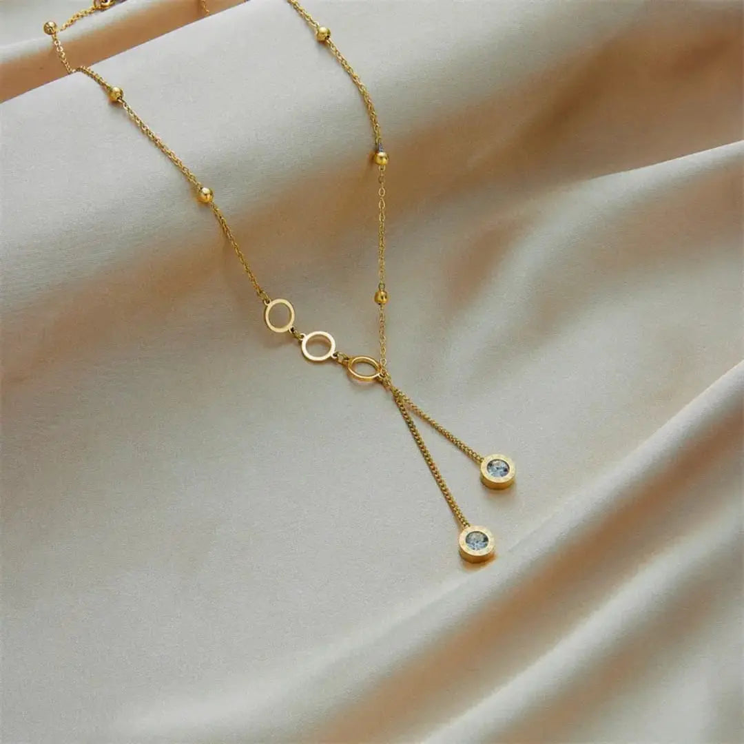 Golden Loops Crystal Necklace – Chic, Classy & Just for You ✨ Zevare.pk